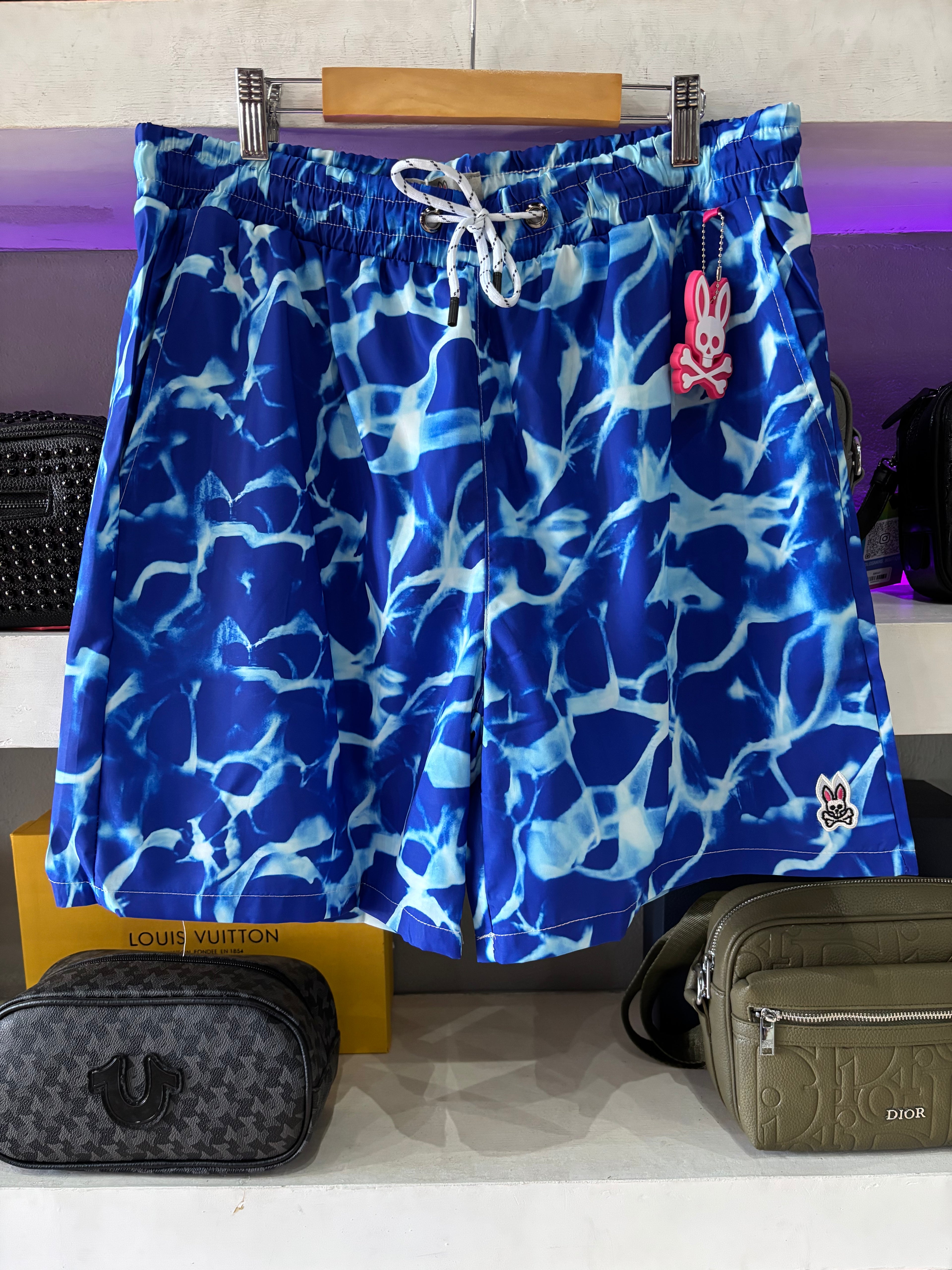 SHORT DE PLAYA PSYCHO BUNNY "AZUL TEXTURA AGUA"