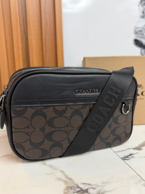CANGURERA COACH "MONOGRAMA CAFE/NEGRO"